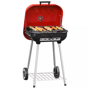 Portable charcoal BBQ grill with temperature control & storage shelf for outdoor cooking.